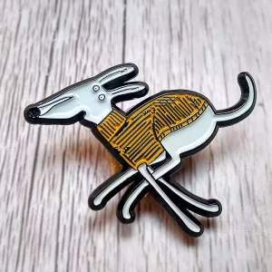 whippet lapel pin badge running dog brooch pin in orange jumper