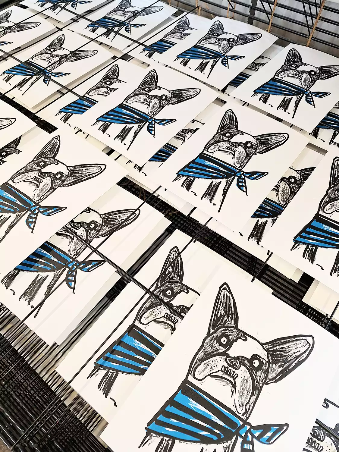 Frenchie bull dog screen prints in drying rack