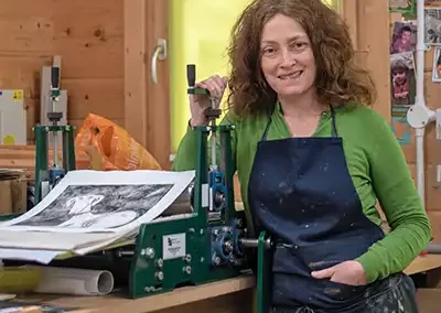 Lucy by her etching press