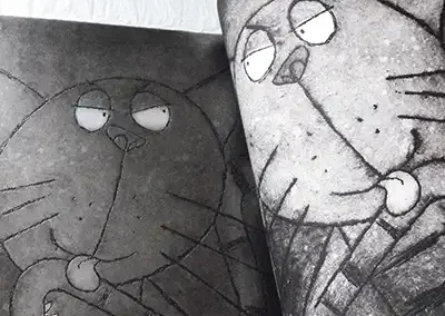 Printing a cat acid etching